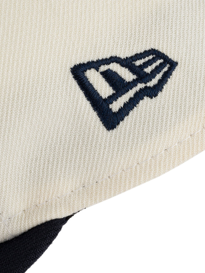 Chain To Bank Corona Laurea New Era RC 9Fifty Hat | CREAM/NAVY