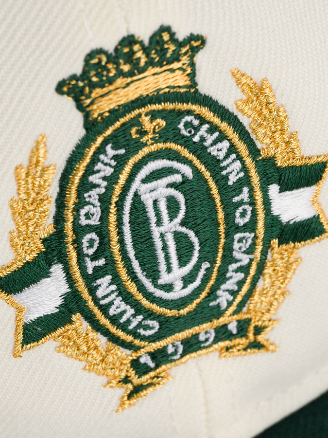 Chain To Bank Corona Laurea New Era RC 9Fifty Hat | CREAM/GREEN