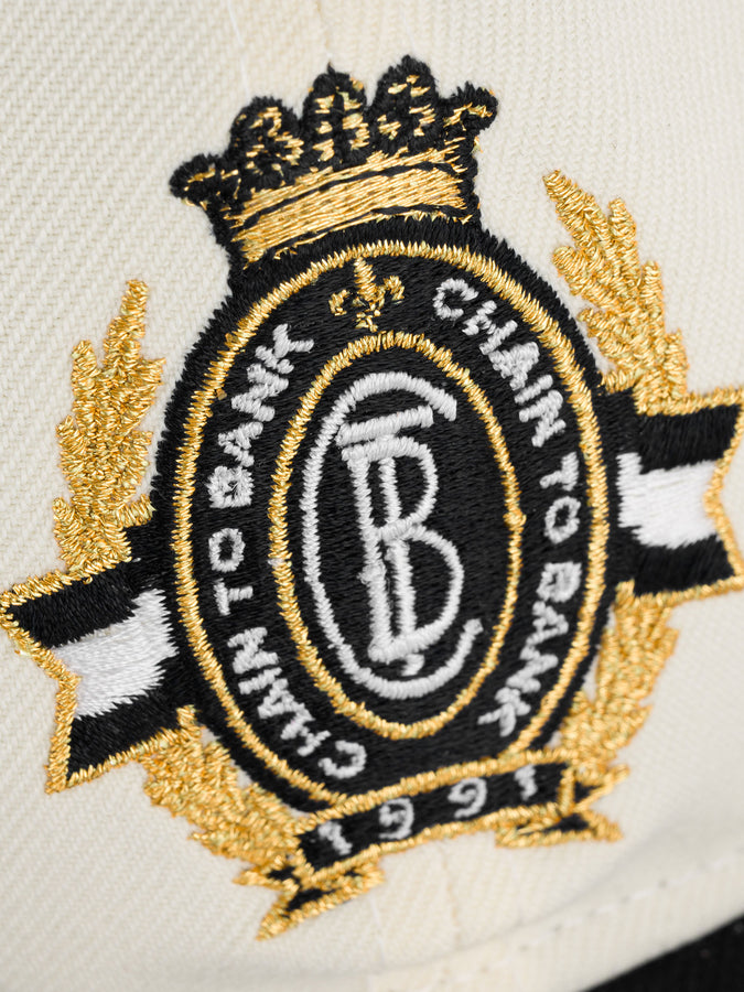 Chain To Bank Corona Laurea New Era RC 9Fifty Hat | CREAM/BLACK