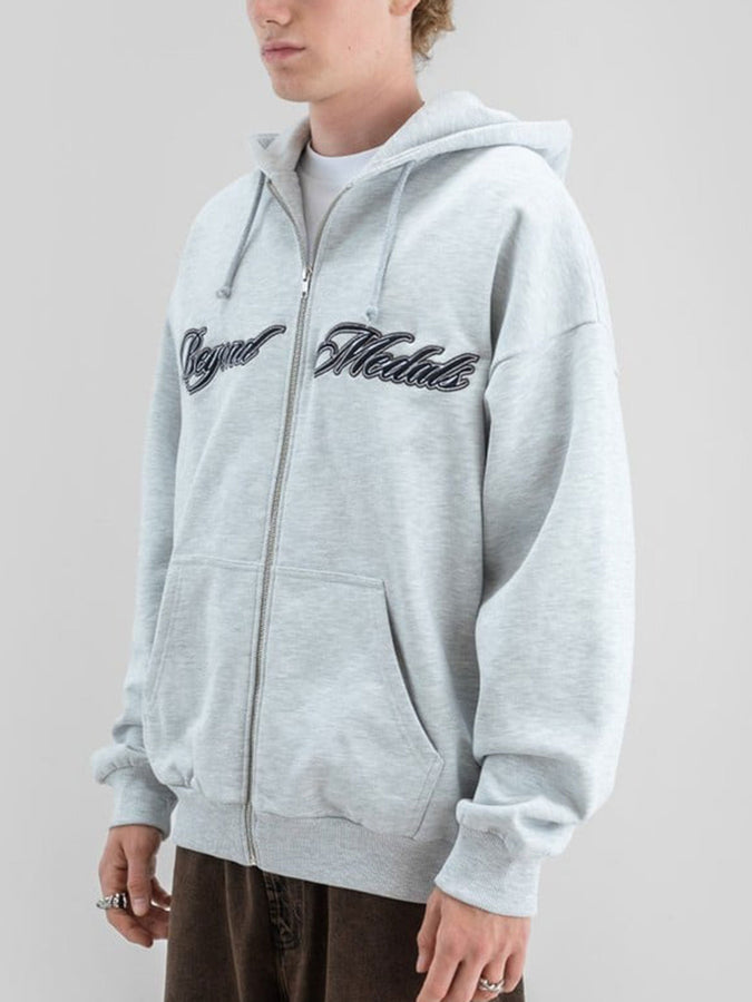 Beyond Medals Script Zip Hoodie Holiday 2026 | GREY MEL
